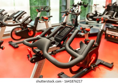 Stationary Bicycles. Indoor Cycling For Lifestyle Design. Fitness Background. Class With Empty Bikes. Soft Focus Background.