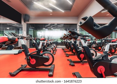 Stationary Bicycles. Indoor Cycling For Lifestyle Design. Fitness Background. Class With Empty Bikes. Soft Focus Background.