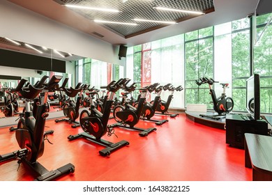 Stationary Bicycles. Indoor Cycling For Lifestyle Design. Fitness Background. Class With Empty Bikes. Soft Focus Background.