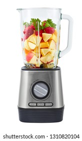 Stationary blender filled with slices of apples, pumpkins, strawberries for making smoothie.