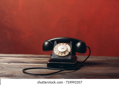 stationary old phone on a red background, vintage - Powered by Shutterstock