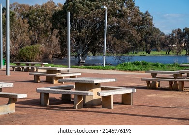 Stationary Picnic Tables In A Recreation Park. No People.