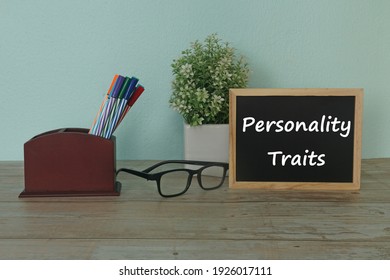stationery and eyeglass on table. Personality traits concept. - Shutterstock ID 1926017111