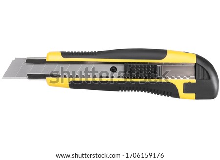 Stationery knife with a blade isolated on a white background
