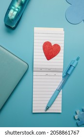 Stationery And Laptop Over Blue Background, Education, Business Or Learning Concept, Flatlay Of School Or Home Office Items. 