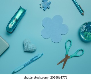 Stationery And Laptop Over Blue Background, Education, Business Or Learning Concept, Flatlay Of School Or Home Office Items. 