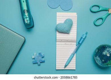 Stationery And Laptop Over Blue Background, Education, Business Or Learning Concept, Flatlay Of School Or Home Office Items. 