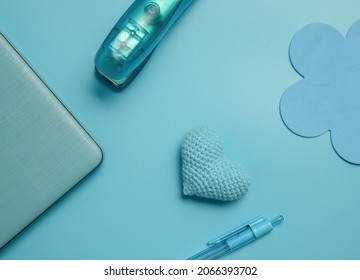 Stationery And Laptop Over Blue Background, Education, Business Or Learning Concept, Flatlay Of School Or Home Office Items. 