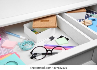 Stationery In Open Desk Drawer Closeup