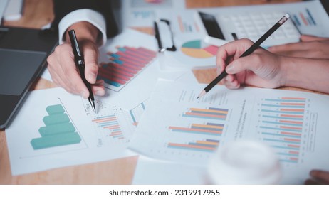 statistical analyst reading graph report and business statistics charts ,Analysis and improvement of corporate strategy ,manage financial and marketing documents , Statistics and Data Concepts