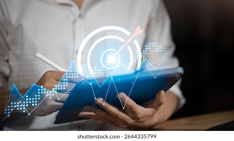 statistical analyst using calculator to calculate and statistics charts ,business growth graph ,Business analytics connected to large databases ,business growth graph ,Statistics and Data Concepts