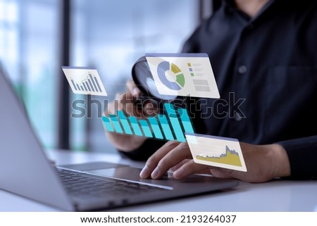 Statistical and data analysis for business finance and investment concepts with business people working on monitor graph dashboard