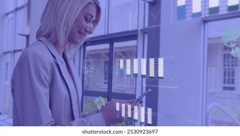 Statistical data processing against caucasian businesswoman using smartphone at office. global networking and business technology concept - Powered by Shutterstock