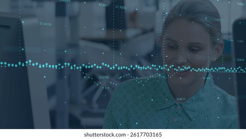Statistical data processing against caucasian woman smiling while working at office. business data and analytics technology concept