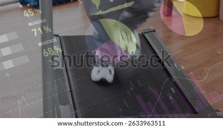 Statistical data processing against low section of a person using treadmill at the gym. Sports, fitness and technology concept