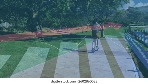 Statistical data processing against rear view of girl riding a scooter in the garden. statistics and data concept