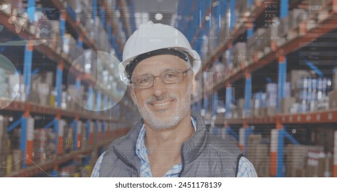 Statistical data processing over portrait of caucasian senior male supervisor smiling at warehouse. logistics and transportation business concept - Powered by Shutterstock