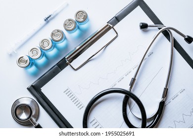 Statistics covid. Doctor stethoscope, hospital healthcare infographic charts and analytic medical statistics on hospital background. Global economy recovery after Covid 19 concept