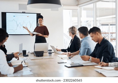 Statistics, presentation and a black woman in a financial meeting, teaching and speaking in a seminar. Planning, strategy and an African boss talking about finance data with business people at work - Powered by Shutterstock