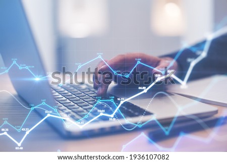 Stats data network concept with abstract digital growing statistic indicators on background with man hand typing on laptop keyboard. Double exposure