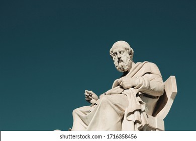 Statue of the ancient Greek philosopher Plato in Athens, Greece. - Shutterstock ID 1716358456