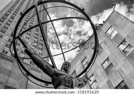 The Statue of Atlas in front of the Rockefeller Center in New York City in black and white