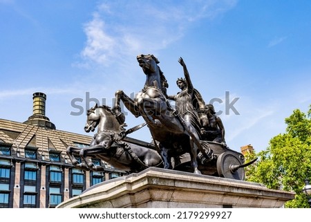 The statue of Boadicea (or Boudicca) and Her Daughters, queen of the British Iceni tribe, by sculptor Thomas Thornycroft, erected on the Victoria Embankment next to Westminster Bridge, London, UK