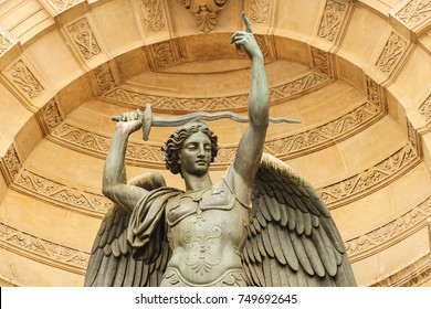 Statue of the bronze Archangel Michael keeping the sword, part of the monumental marble (26 meters by 15 meters) fountain Saint-Michel opened in 1860 during the French Second Empire, Paris, France
