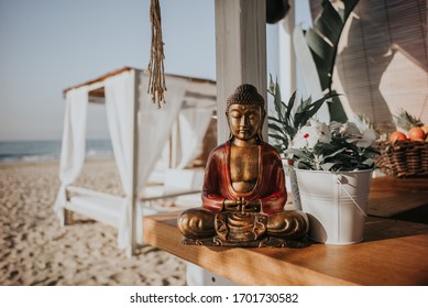 Statue Of Buddha Close Up In The Beach Bar With Sea View 