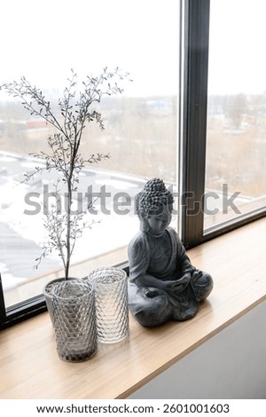 statue of buddha. statue on the bedside table