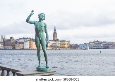 Statue Of Carl Eldh And View Of Gamla Stan In Stockholm