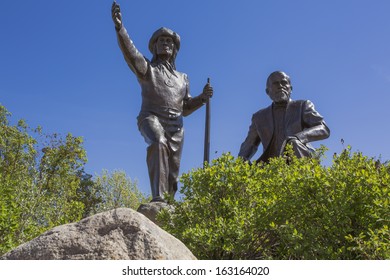 Statue Of Chief Whitecap (standing) And John Neilson Lake (seated) In River Landing, Saskatoon