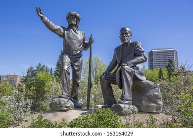 Statue Of Chief Whitecap (standing) And John Neilson Lake (seated) In River Landing, Saskatoon