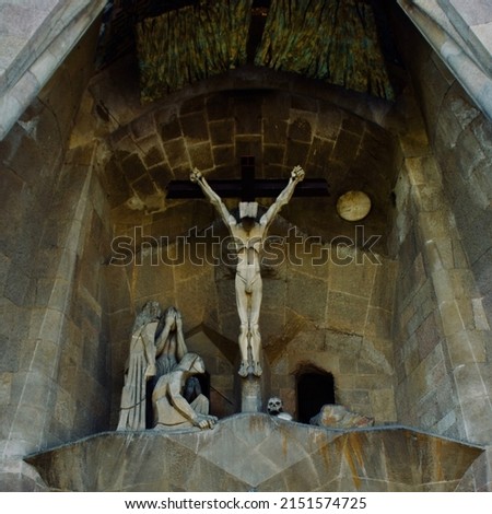 The statue of the crucified Jesus Christ on the facade of the Sagrada Familia Cathedral  Barcelona