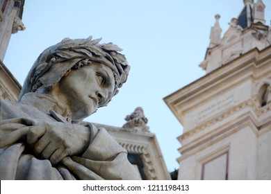 The statue of Dante Alighieri, author of the Divine Comedy, in front of the Basilica of Santa Croce in the heart of Florence.