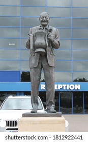 Statue Of Dave Whelan With FA Cup DW Stadium In Wigan Manchester. Wigan, Manchester, UK, September 2020: