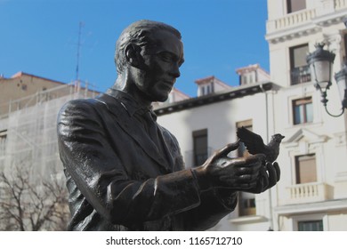 Statue Of The Famous Poet, Federico García Lorca With A Pigeon On Saint Anne Square (Plaza De Santa Ana) In Madrid, Spain, Europe. Old Town Neighborhood In The True Inner City Of Madrid.