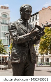 Statue Of The Famous Poet, Federico García Lorca With A Pigeon On Saint Anne Square (Plaza De Santa Ana) In Madrid, Spain, Europe. Old Town Neighborhood In The True Inner City Of Madrid.