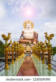 Statue Of A Fat Chinese Priest In Buddhist Temple At Koh Samui,Thailand.