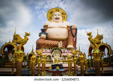 Statue Of A Fat Chinese Priest In Buddhist Temple At Koh Samui,Thailand.