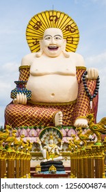 Statue Of A Fat Chinese Priest In Buddhist Temple At Koh Samui,Thailand.