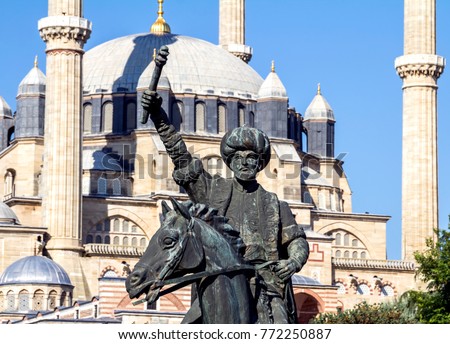 Statue of Fatih Sultan Mehmet and Selimiye Mosque in Edirne, Turkey. The UNESCO World Heritage Site of the Selimiye Mosque, built by Mimar Sinan in 1575.