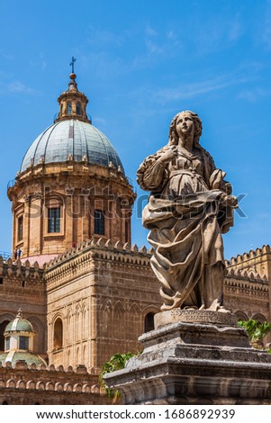 Statue in front of the Palermo Cathedral: the cathedral church of the Roman Catholic Archdiocese of Palermo, located in Sicily, southern Italy. It is dedicated to the Assumption of the Virgin Mary