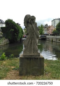 statue front of the river