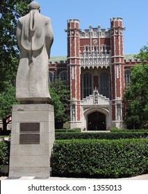 Statue in front of school building