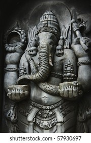 A statue of Ganesha, one of the Hindu Gods, carved in the style of Javanese art - Shutterstock ID 57930697