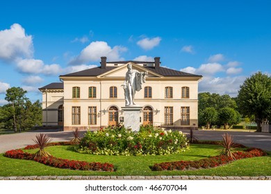 Statue And Garden In Front Of The Drottningholm Palace Theater In Stockholm, Sweden