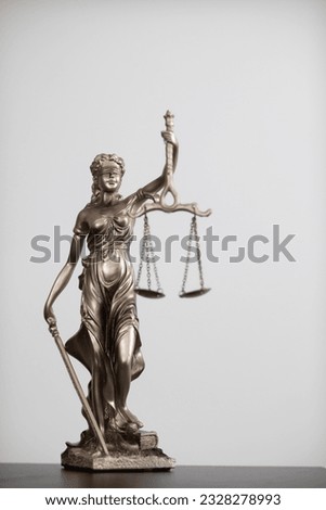 statue of god Themis Lady Justice is used as symbol of justice within law firm to demonstrate truthfulness of  facts and power to judge without prejudice. Themis Lady Justice is of justice.