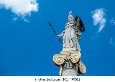 Statue of the goddess Athina, the goddess of piece, wisdom and culture, daughter of Zeus and protector of the city of Athens, Greece. The statue is right outside the Academy of Athens.