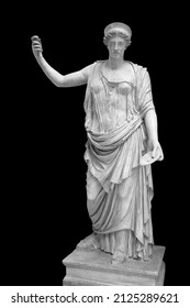 Statue of the Greek goddess Hera or the Roman goddess Juno isolated on black with clipping path. Goddess of women, marriage, family and childbirth. Ancient sculpture